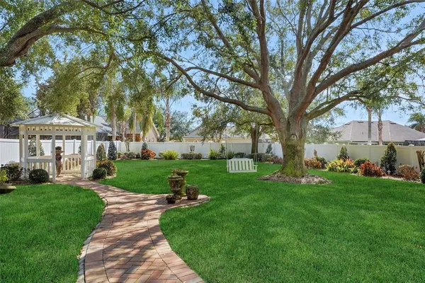 a view of a big yard next to a house