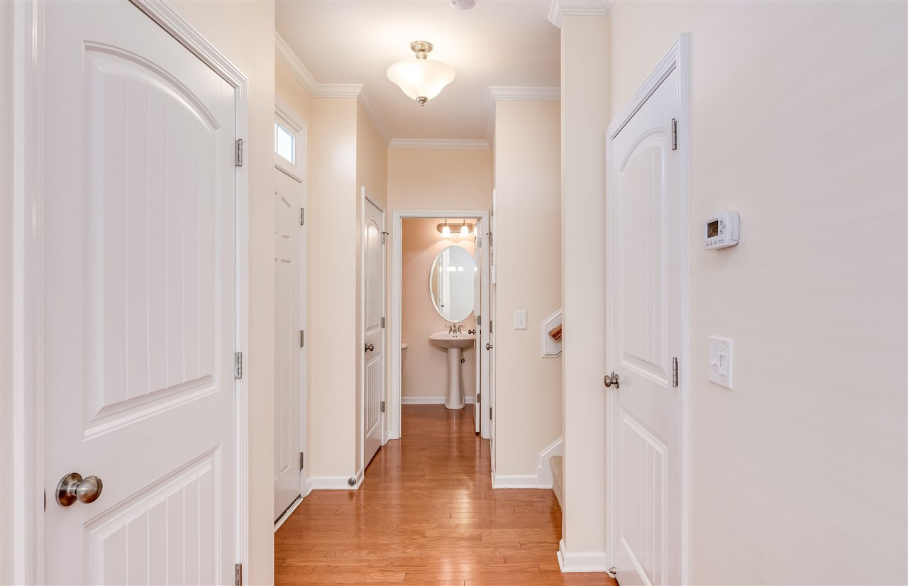 2443 Memory Ridge Drive Raleigh, NC 27606 - Photo 9 of 28 Wide foyer with pantry, understairs storage and half bath Foyer
