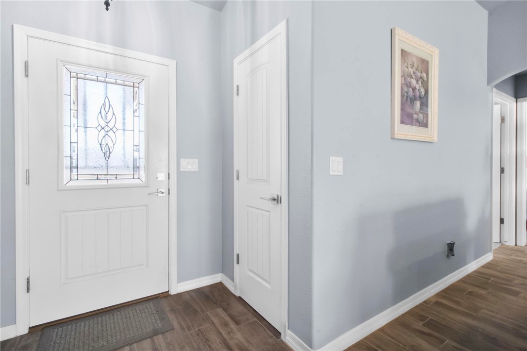 3897 Easy Street Kingman, AZ 86409 - Photo 5 of 53 a view of hallway with window and wooden floor