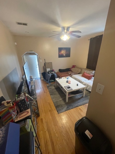 2620 West 24th Street Chicago, IL 60608 - Photo 12 of 25 a living room with furniture and wooden floor