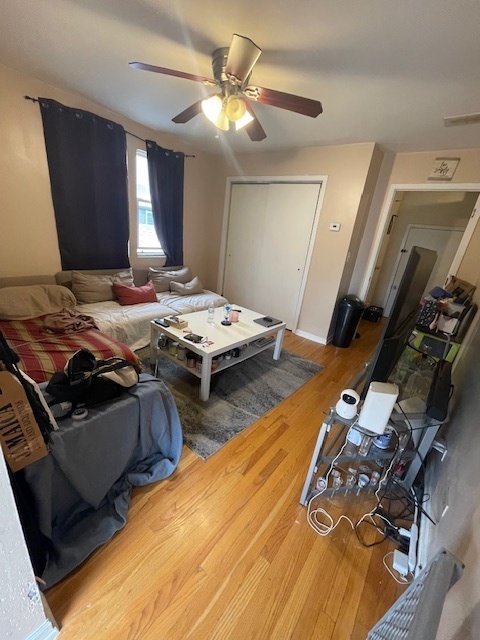 2620 West 24th Street Chicago, IL 60608 - Photo 13 of 25 a bed room with two beds and a ceiling fan