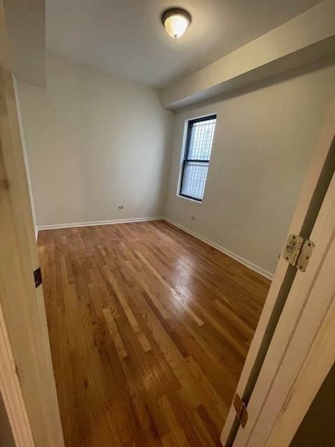 2620 West 24th Street Chicago, IL 60608 - Photo 21 of 25 a view of an empty room and window