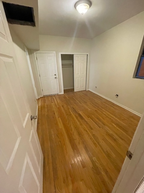 2620 West 24th Street Chicago, IL 60608 - Photo 22 of 25 a bathroom with a bathtub