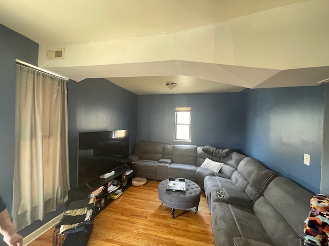 2620 West 24th Street Chicago, IL 60608 - Photo 4 of 25 a living room with furniture and a window