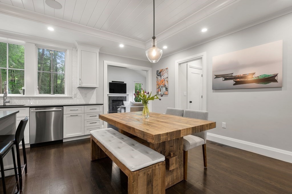 76 Paulson Road Newton, MA 02468 - Photo 14 of 41 a kitchen with a table and chairs in it