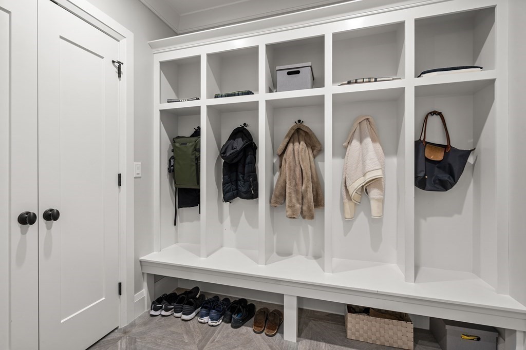 76 Paulson Road Newton, MA 02468 - Photo 15 of 41 a view of walk in closet with clothes and shoes
