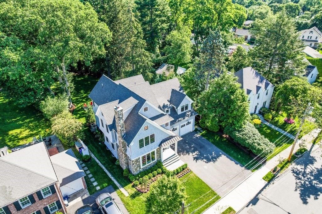 76 Paulson Road Newton, MA 02468 - Photo 2 of 41 an aerial view of a house with a yard
