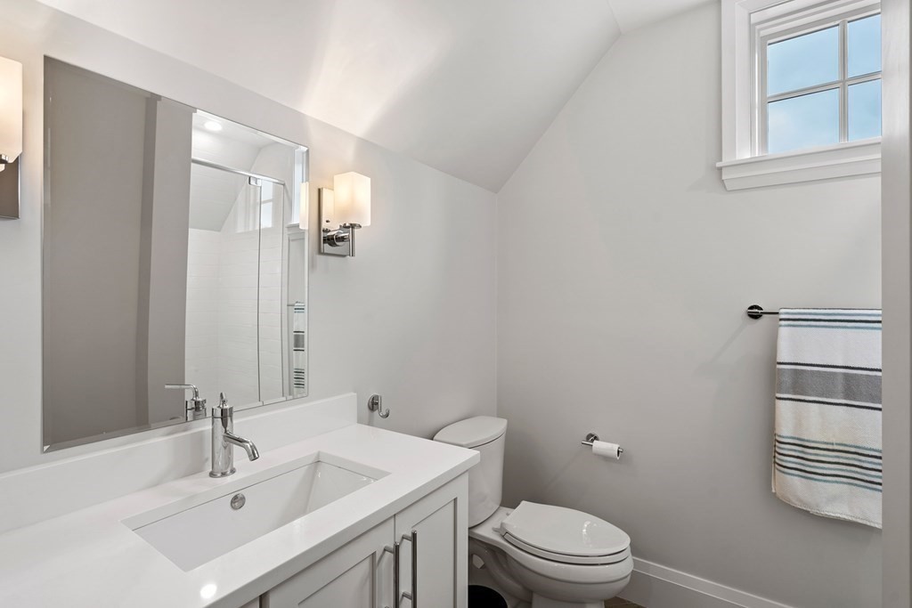 76 Paulson Road Newton, MA 02468 - Photo 24 of 41 a bathroom with a sink a toilet and shower