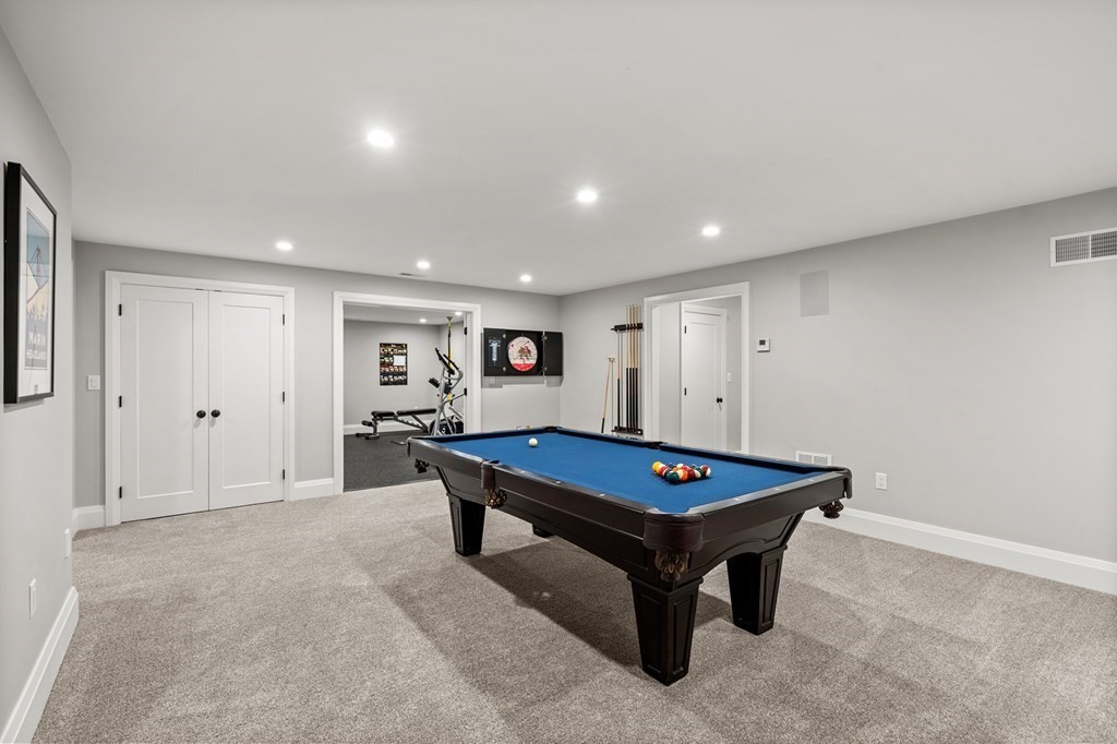 76 Paulson Road Newton, MA 02468 - Photo 36 of 41 a room with furniture pool table and projector