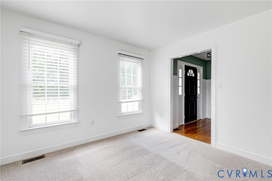 16044 Parsons Road Beaverdam, VA 23015 - Photo 12 of 44 an empty room with windows