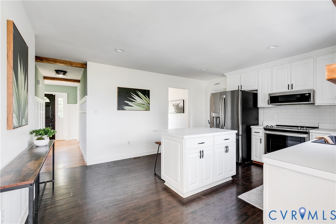 16044 Parsons Road Beaverdam, VA 23015 - Photo 17 of 44 a kitchen with cabinets and wooden floor