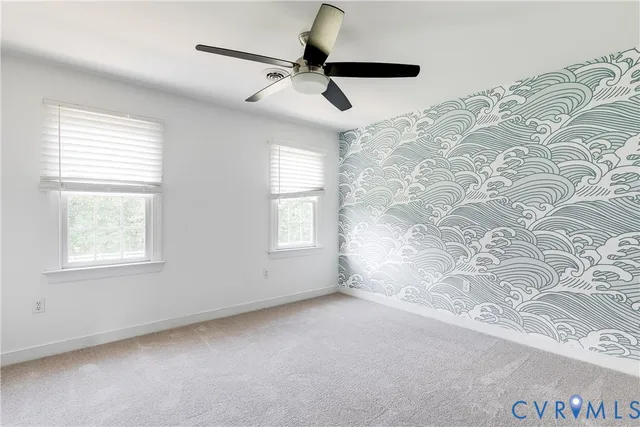 a view of empty room with windows