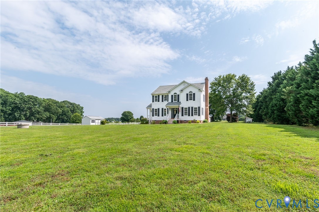 16044 Parsons Road Beaverdam, VA 23015 - Photo 35 of 44 a view of a big room with a big yard and large trees