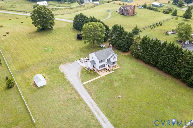 a view of a swimming pool with a yard