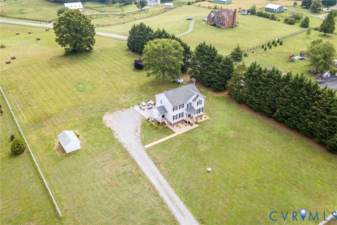 16044 Parsons Road Beaverdam, VA 23015 - Photo 38 of 44 a view of a swimming pool with a yard