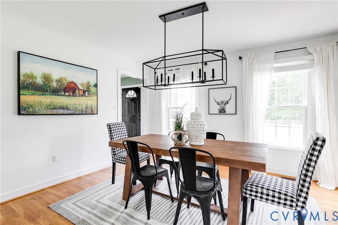 16044 Parsons Road Beaverdam, VA 23015 - Photo 6 of 44 a view of a dining room with furniture window and wooden floor
