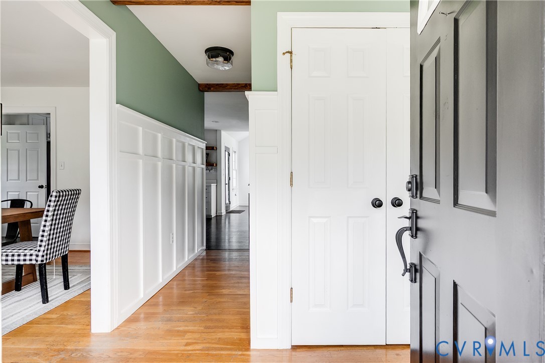 16044 Parsons Road Beaverdam, VA 23015 - Photo 9 of 44 a view of a hallway with wooden floor and staircase