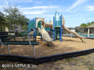 3631 Kirkpatrick Circle, Unit 6 Jacksonville, FL 32210 - Photo 14 of 14 a view of a swimming pool with a deck and a potted plant