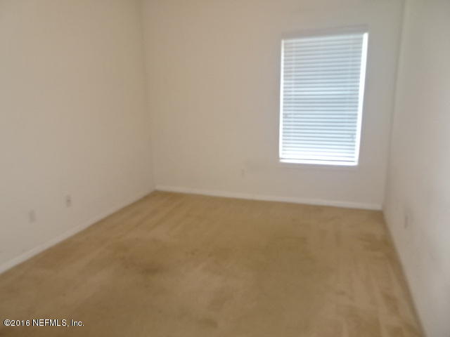 3631 Kirkpatrick Circle, Unit 6 Jacksonville, FL 32210 - Photo 8 of 14 an empty room with a window