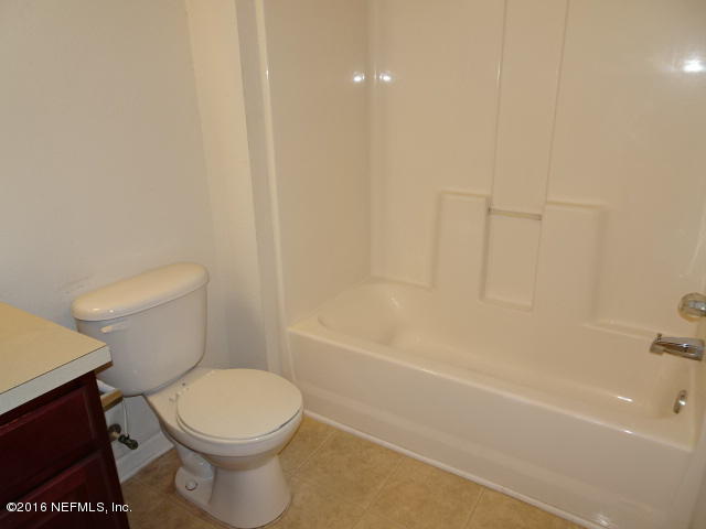 3631 Kirkpatrick Circle, Unit 6 Jacksonville, FL 32210 - Photo 10 of 14 a bathroom with a toilet and a bathtub