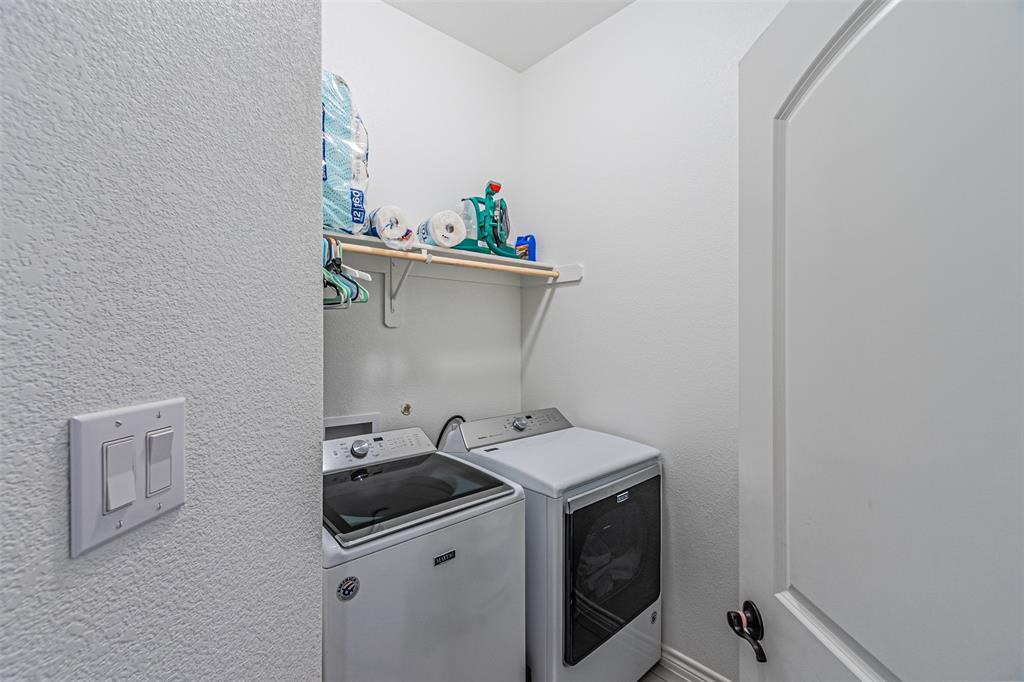 7201 Windy Ridge Drive Fort Worth, TX 76123 - Photo 12 of 36 a utility room with sink dryer and washer