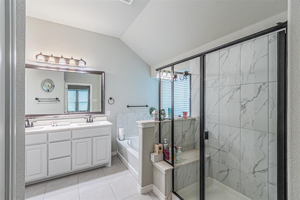 7201 Windy Ridge Drive Fort Worth, TX 76123 - Photo 28 of 36 a bathroom with a double vanity sink mirror and shower