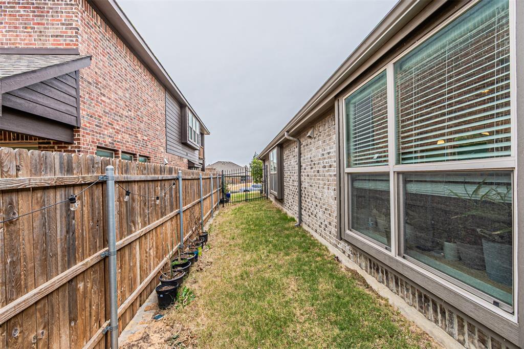 7201 Windy Ridge Drive Fort Worth, TX 76123 - Photo 31 of 36 a view of a house with wooden stairs
