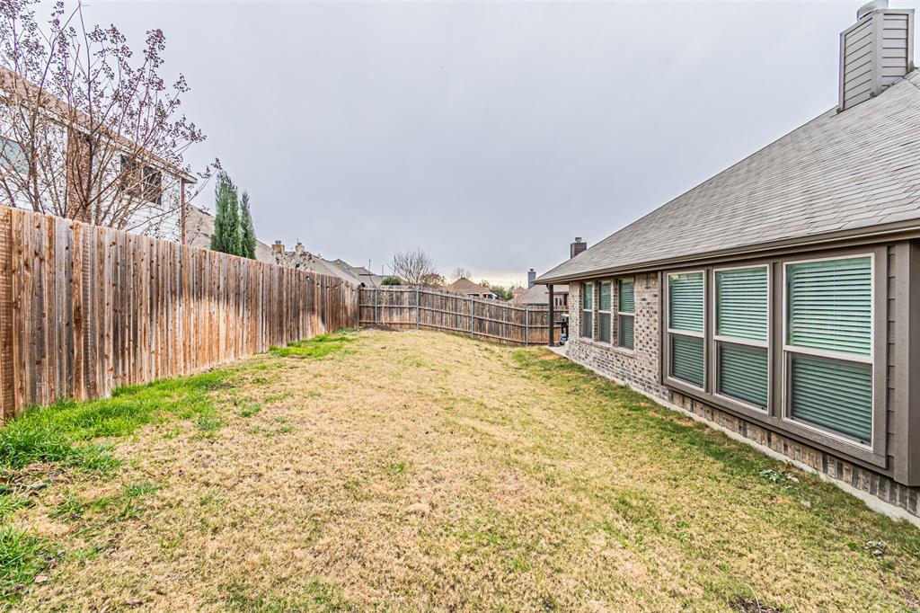 7201 Windy Ridge Drive Fort Worth, TX 76123 - Photo 36 of 36 a view of backyard of the house