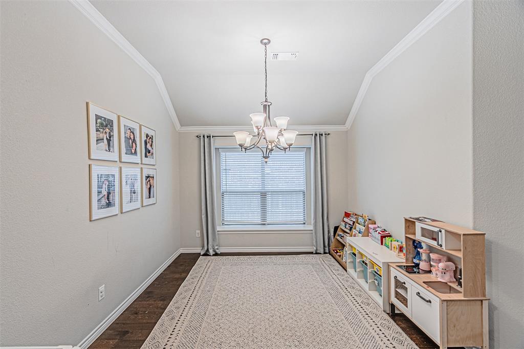 7201 Windy Ridge Drive Fort Worth, TX 76123 - Photo 9 of 36 a very nice looking bedroom with a bed and a window