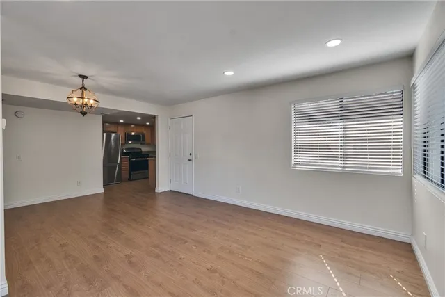 a kitchen with granite countertop a sink and a window