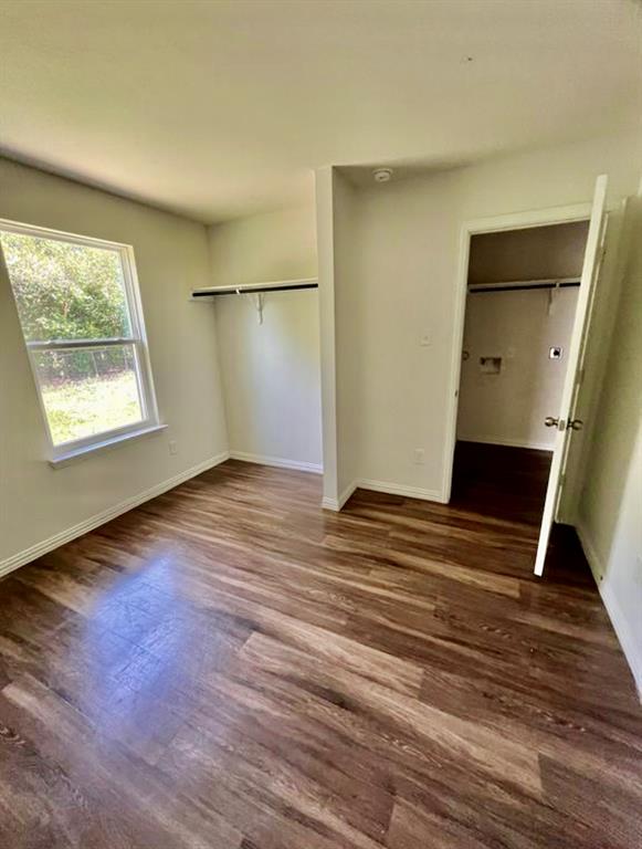 812 South 22nd Street Temple, TX 76501 - Photo 25 of 34 a view of empty room with wooden floor and fan