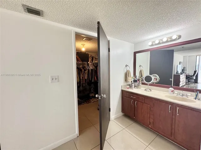 a living room with furniture rug and window