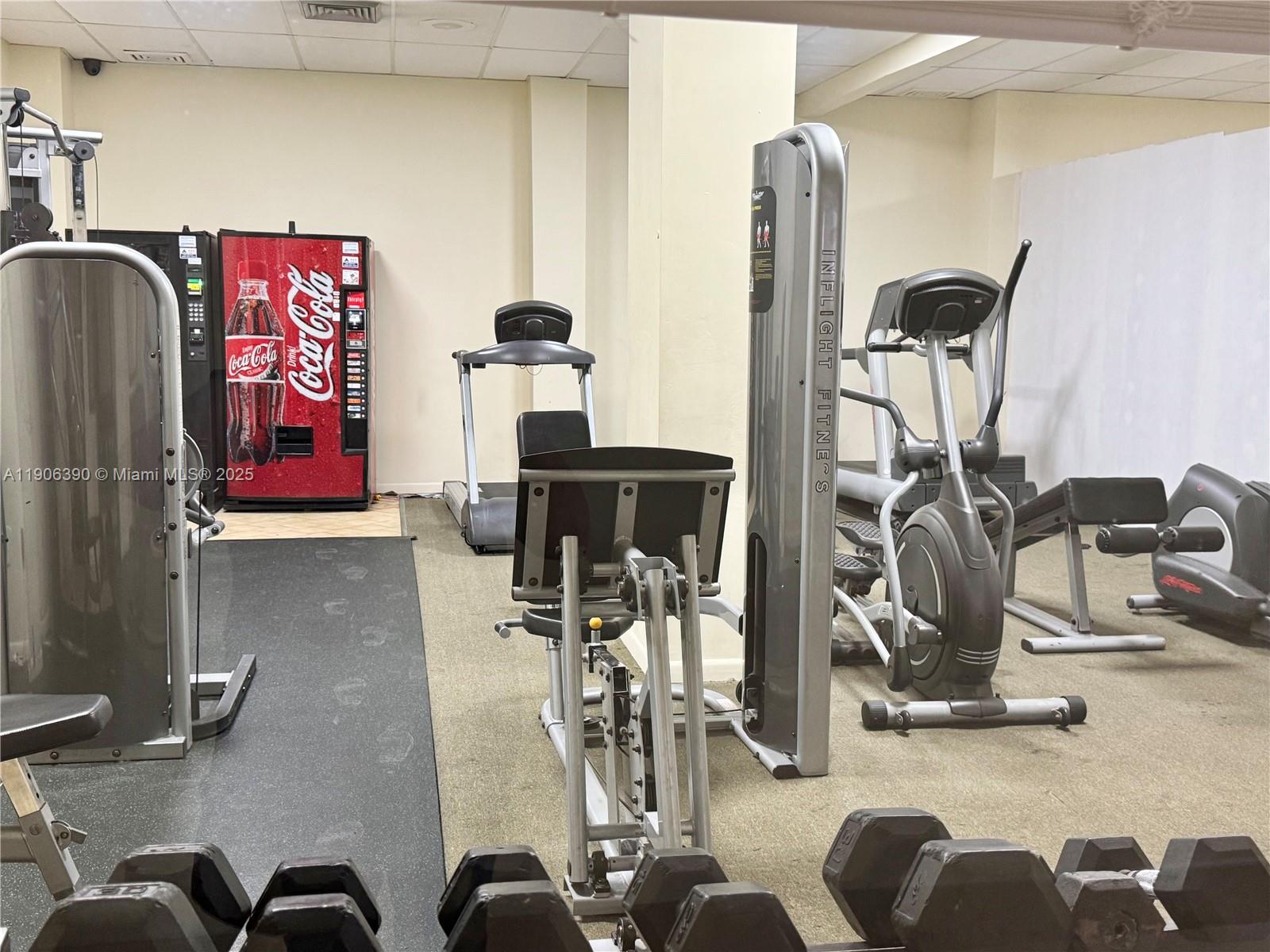 210 174th Street, Unit 1002 Sunny Isles Beach, FL 33160 - Photo 33 of 34 a view of a room with gym equipment