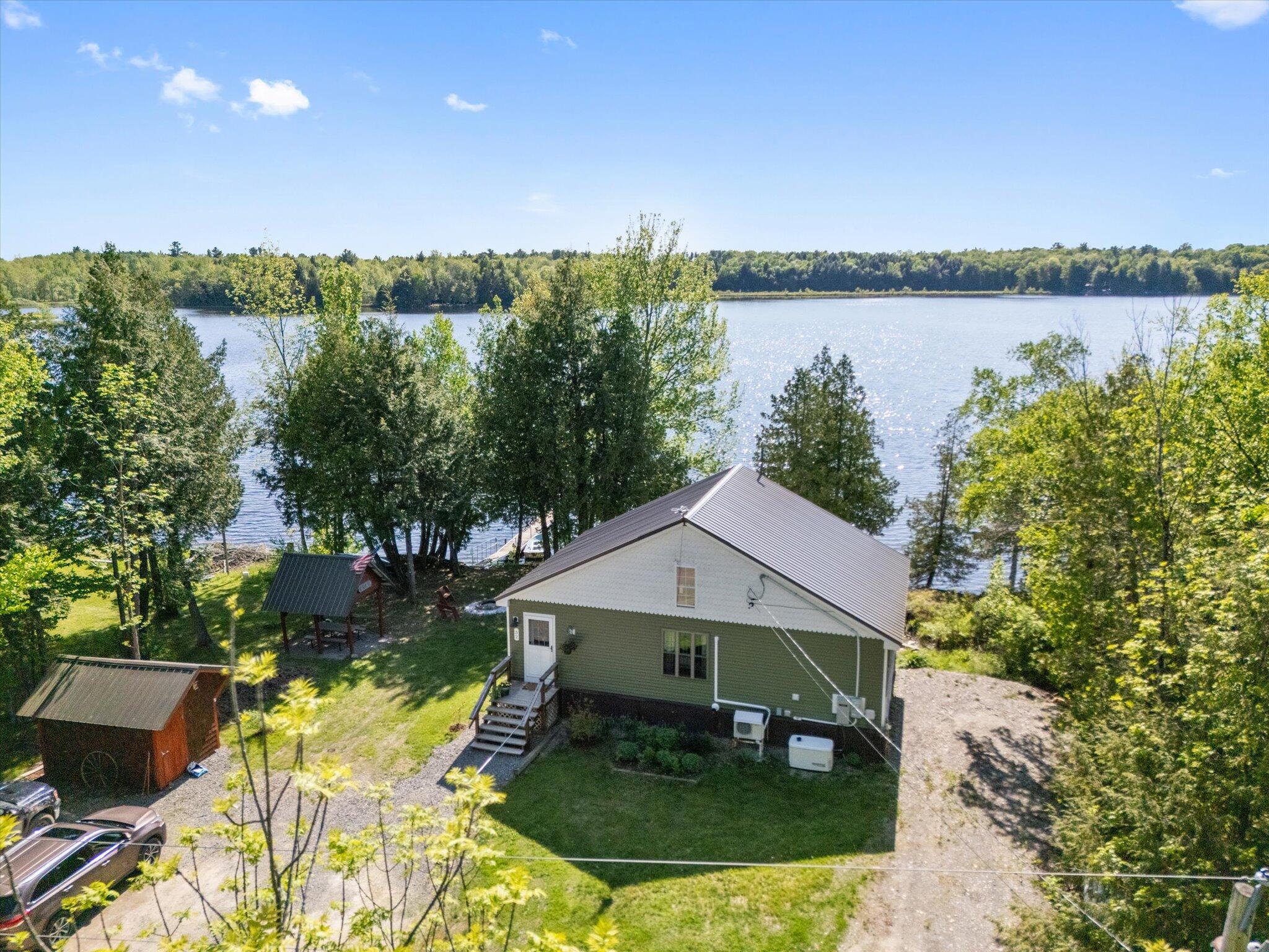 32 Whites Pond Road Palmyra, ME 04965 - Photo 1 of 62 01-DJI_20250528160308_0030_D