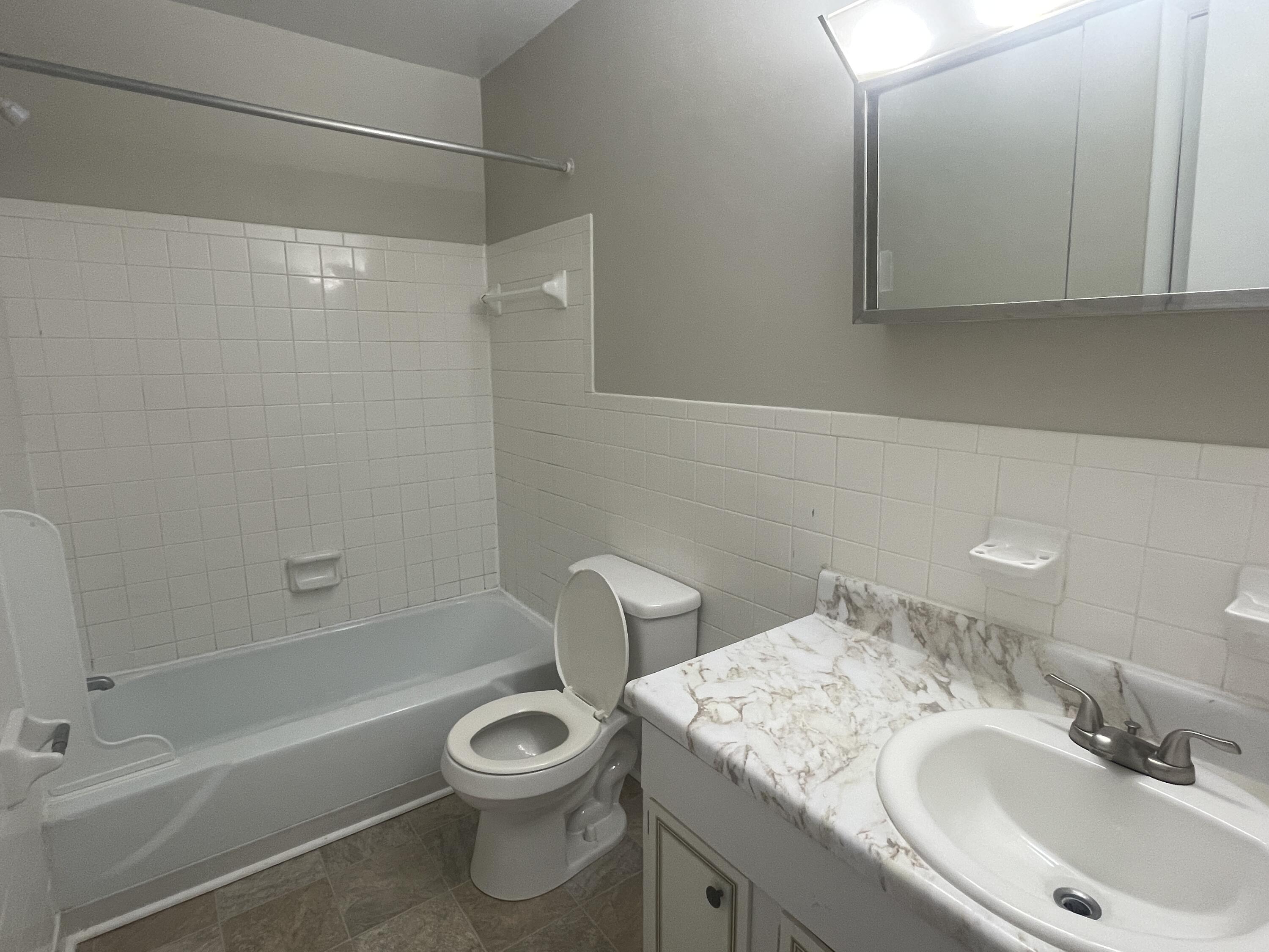 729 Townside Road Southwest, Unit 35 Roanoke, VA 24014 - Photo 4 of 6 a bathroom with a sink a toilet and shower
