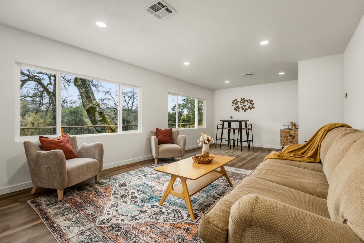 16098 Wild Oak Ranch Road Grass Valley, CA 95949 - Photo 11 of 45 a living room with furniture and a large window
