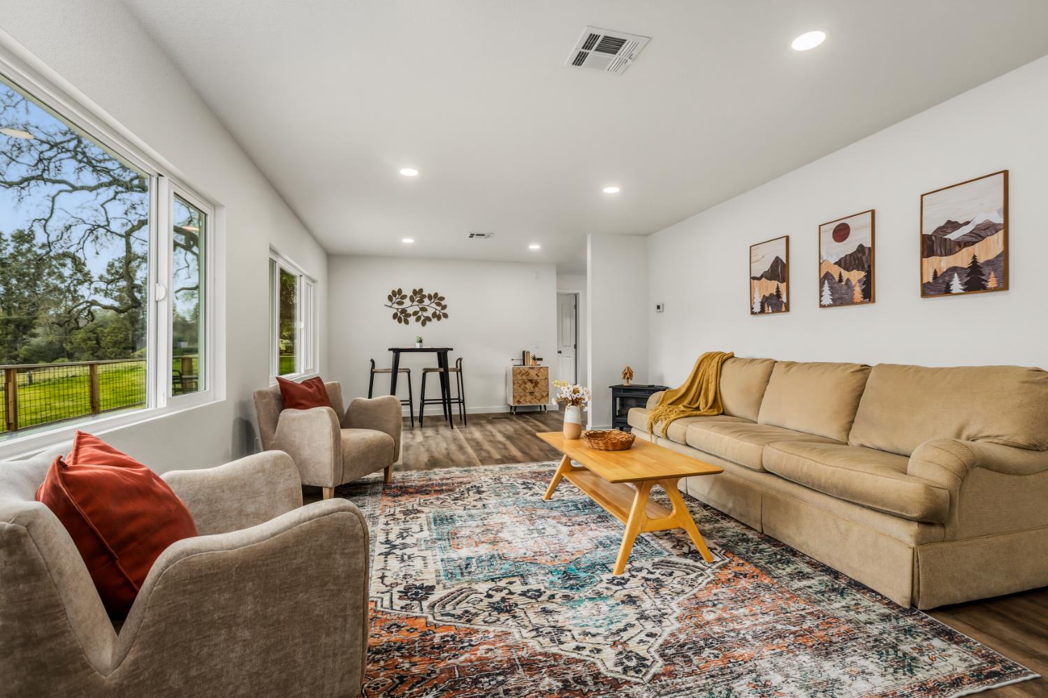 16098 Wild Oak Ranch Road Grass Valley, CA 95949 - Photo 12 of 45 a living room with furniture and a large window
