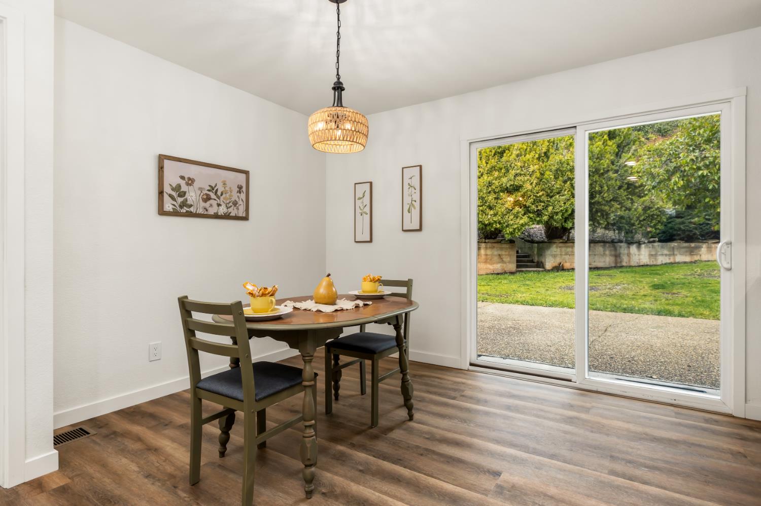 16098 Wild Oak Ranch Road Grass Valley, CA 95949 - Photo 14 of 45 a view of a dining room with furniture window and wooden floor