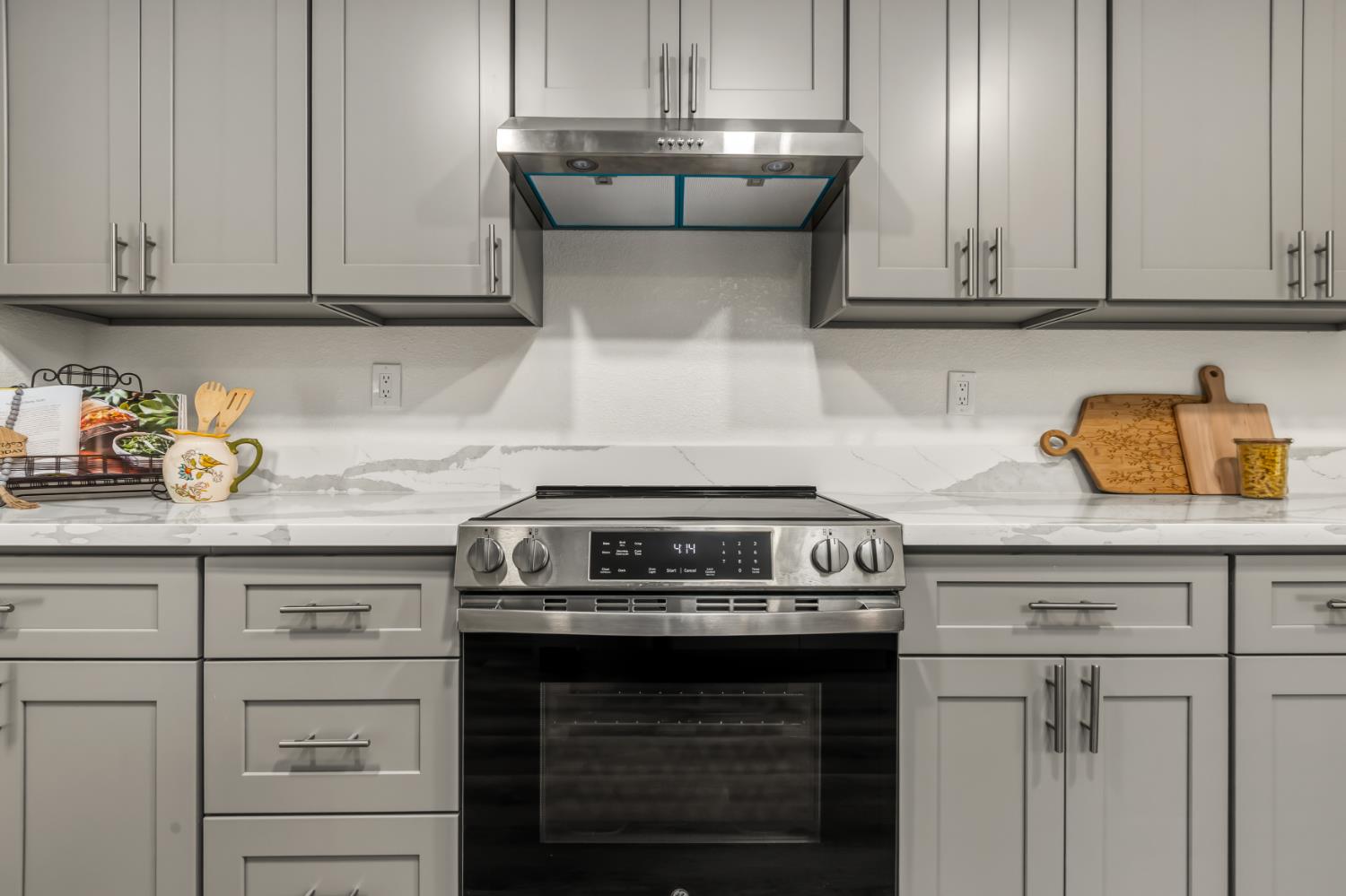 16098 Wild Oak Ranch Road Grass Valley, CA 95949 - Photo 17 of 45 a stove top oven sitting inside of a kitchen