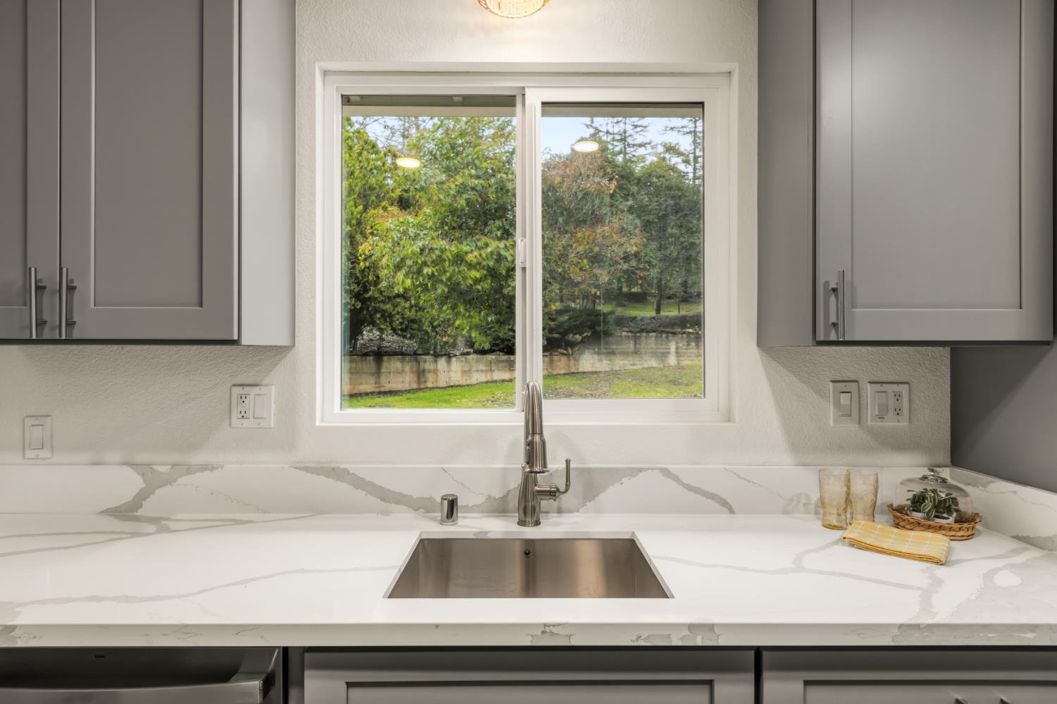 16098 Wild Oak Ranch Road Grass Valley, CA 95949 - Photo 18 of 45 a kitchen sink with a sink