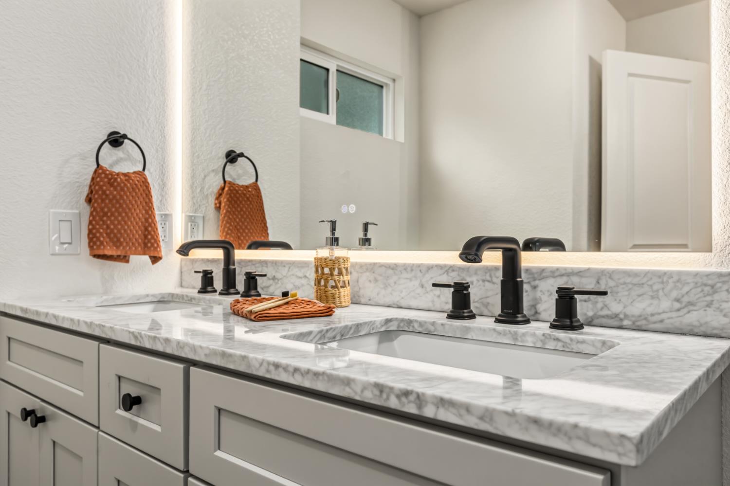 16098 Wild Oak Ranch Road Grass Valley, CA 95949 - Photo 24 of 45 a bathroom with sink and a mirror