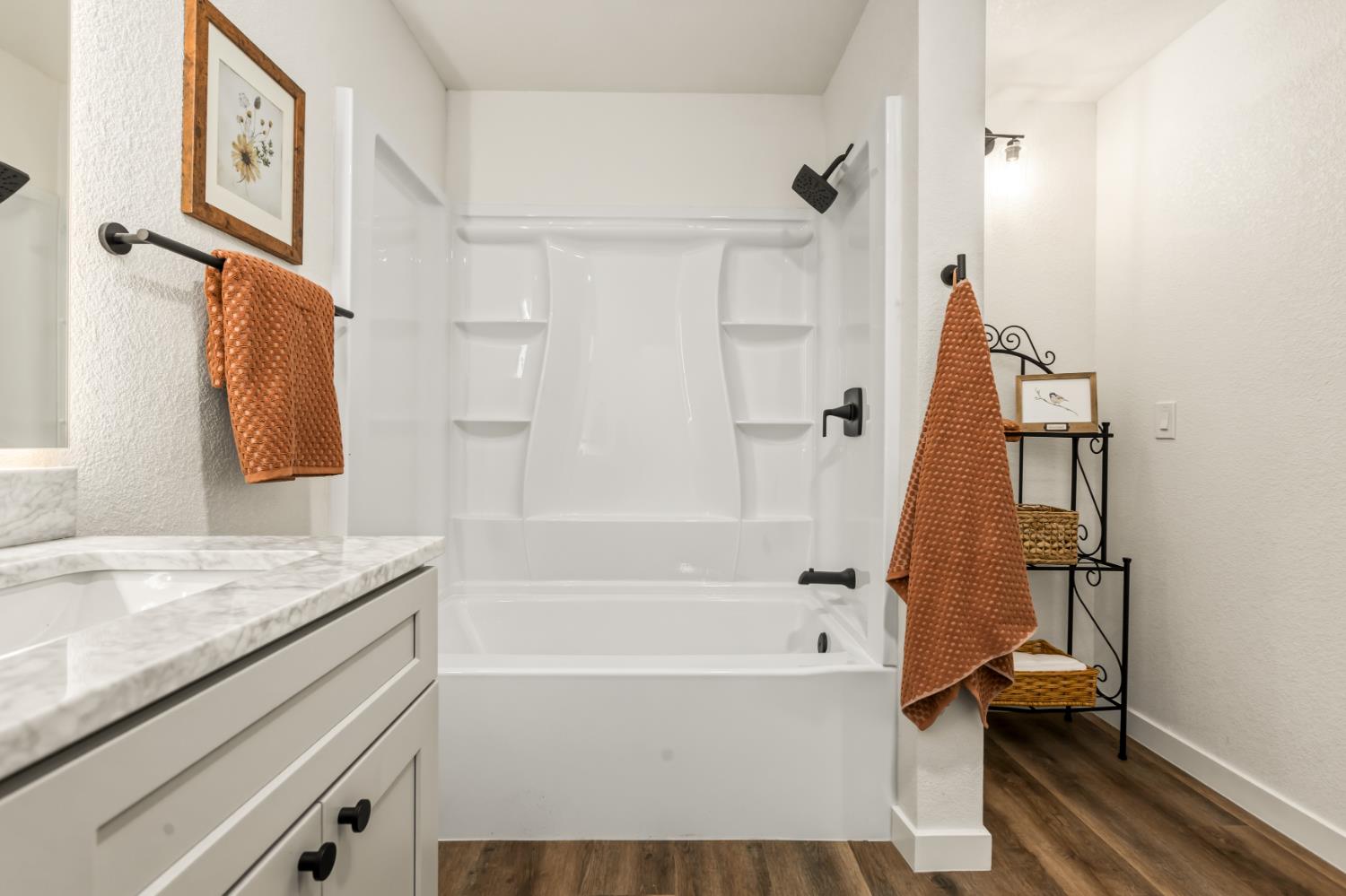 16098 Wild Oak Ranch Road Grass Valley, CA 95949 - Photo 25 of 45 a bathroom with a granite countertop sink a toilet and bathtub