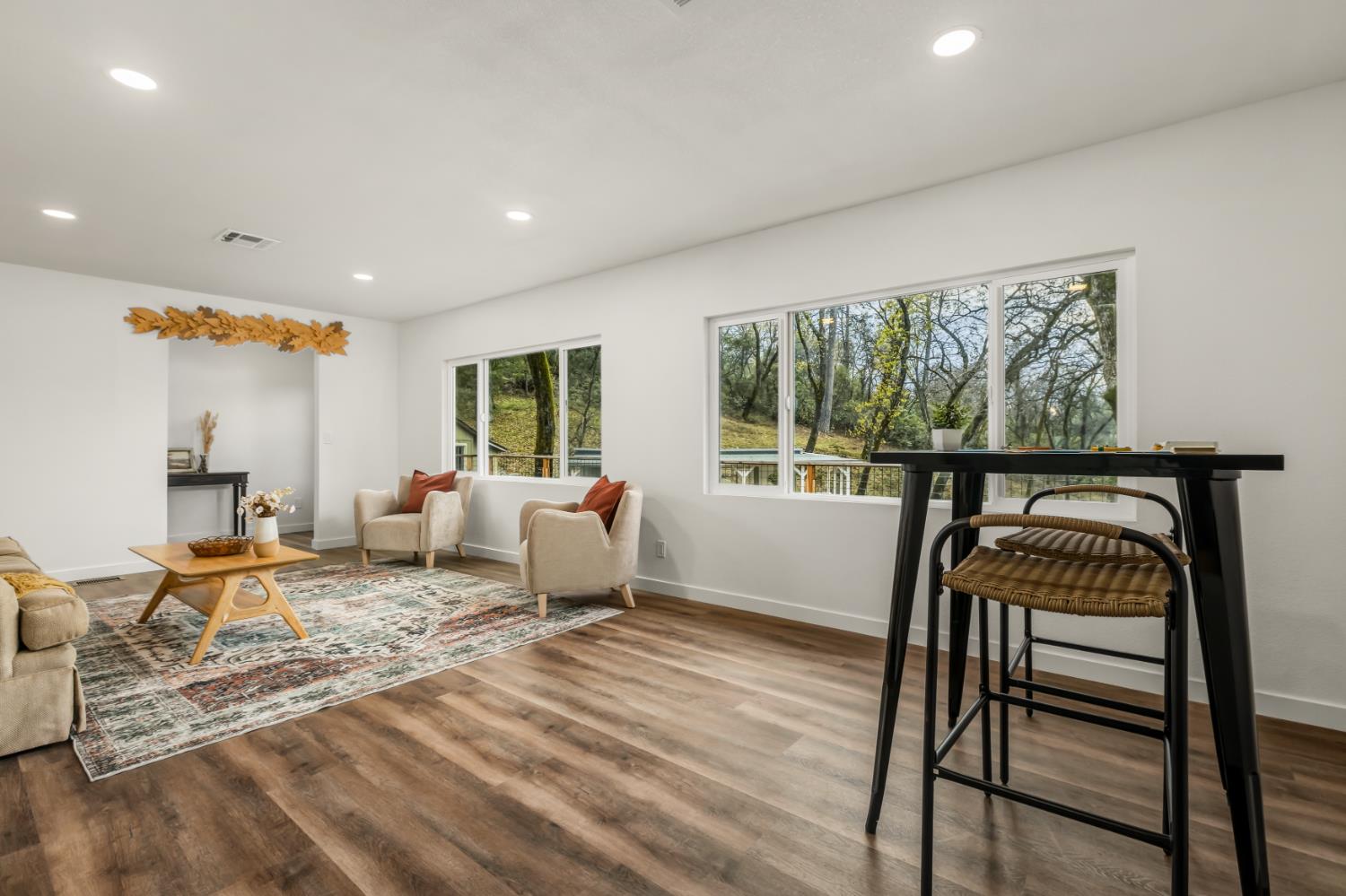 16098 Wild Oak Ranch Road Grass Valley, CA 95949 - Photo 45 of 45 a bedroom with furniture and a large window