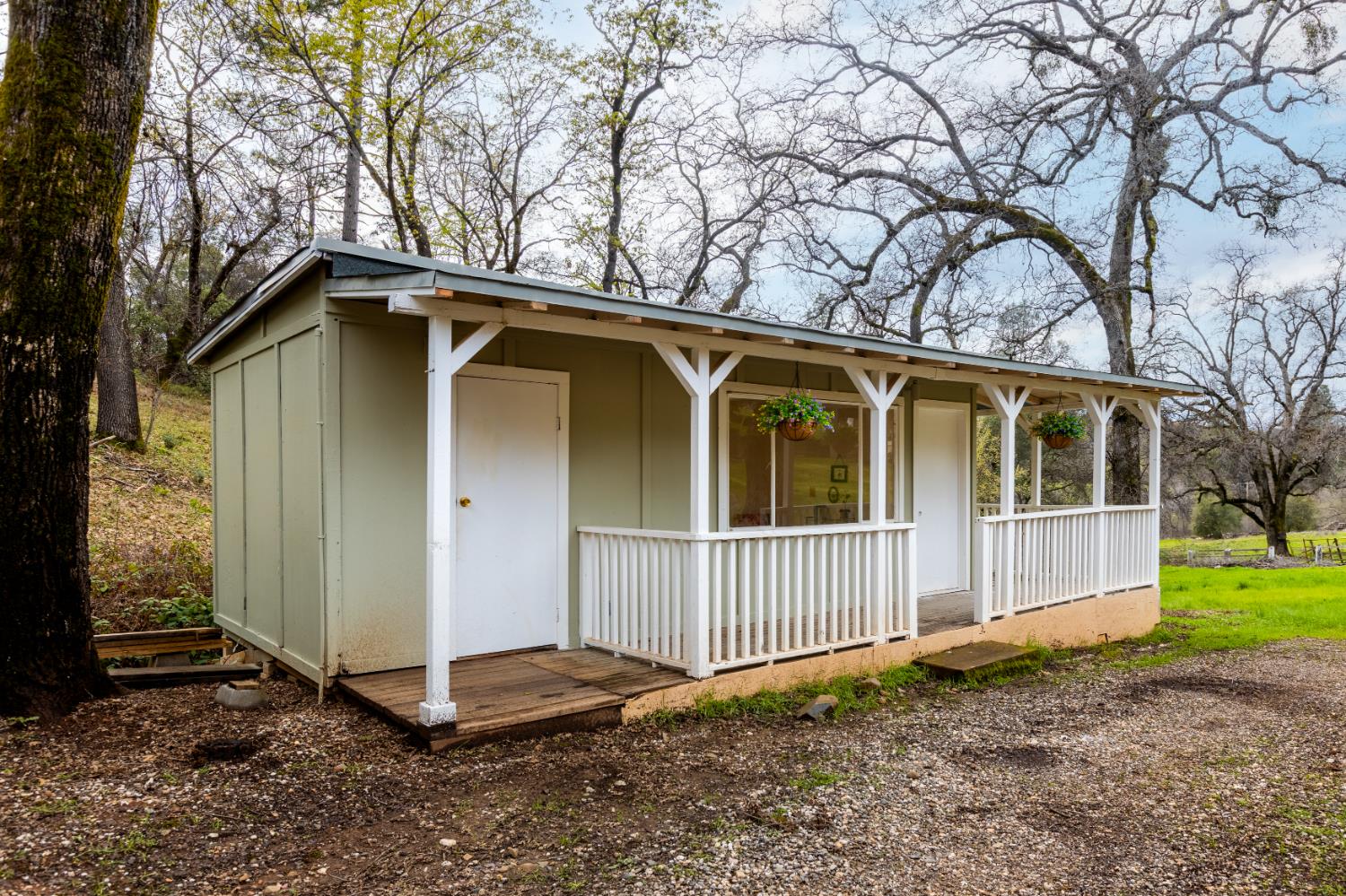 16098 Wild Oak Ranch Road Grass Valley, CA 95949 - Photo 32 of 45 a view of a house with a yard