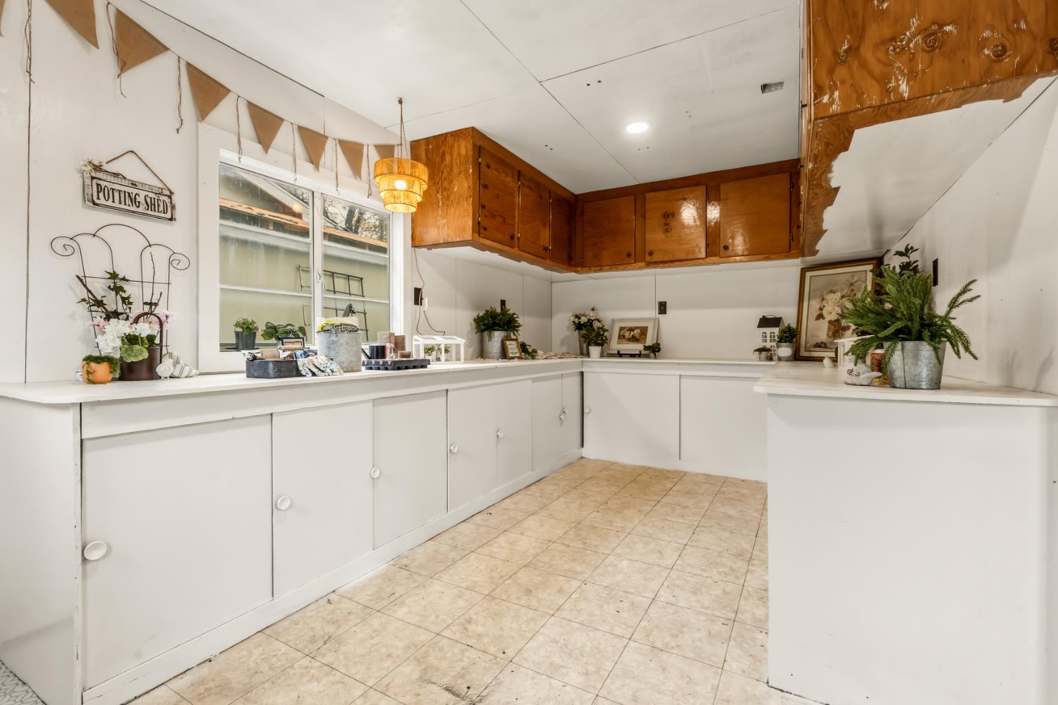 16098 Wild Oak Ranch Road Grass Valley, CA 95949 - Photo 34 of 45 a kitchen with a sink and cabinets