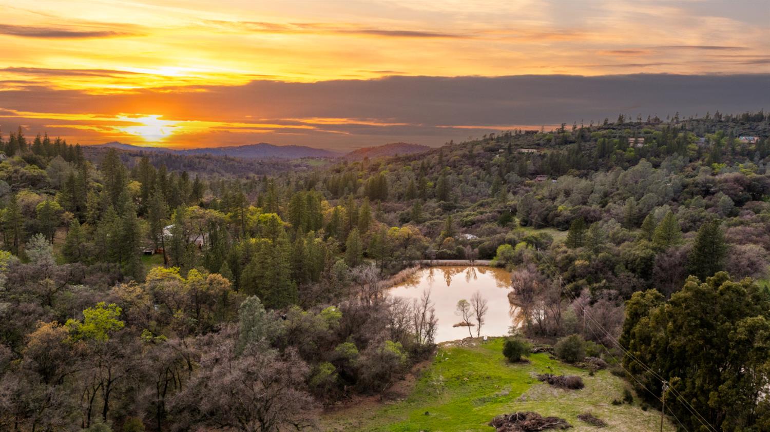 16098 Wild Oak Ranch Road Grass Valley, CA 95949 - Photo 42 of 45 a view of a city with mountains in the background