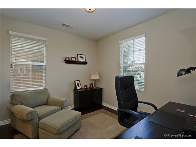 2681 Paradise Road Carlsbad, CA 92009 - Photo 15 of 23 Downstairs bedroom with upgraded wood flooring, now used as an office
