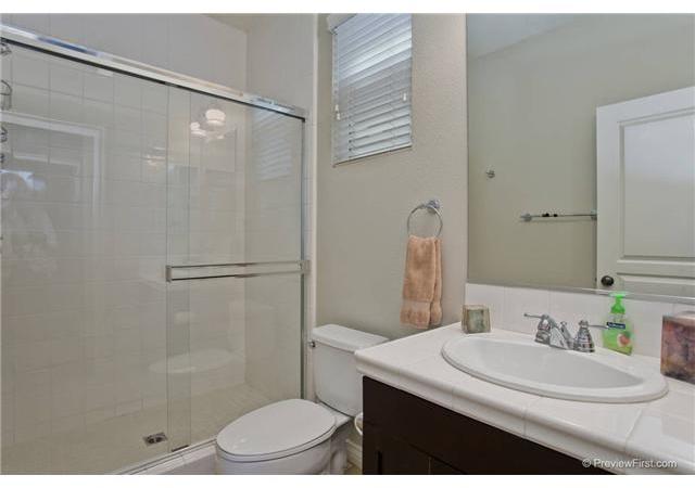 2681 Paradise Road Carlsbad, CA 92009 - Photo 16 of 23 Ensuite bath with downstairs bedroom currently being used as an office