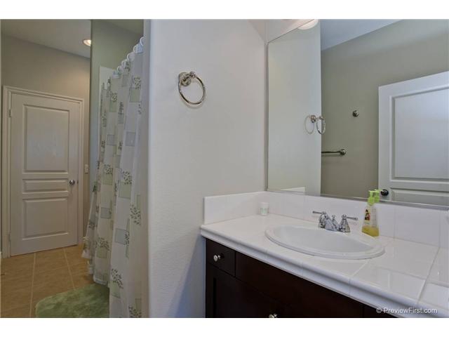 2681 Paradise Road Carlsbad, CA 92009 - Photo 21 of 23 Between two bedrooms with separate sinks outside of shower/bath and toilet area