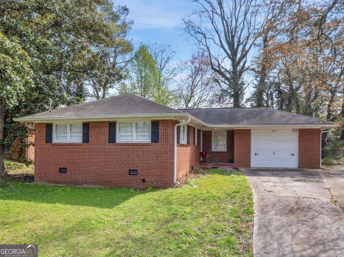 front view of a house with a yard